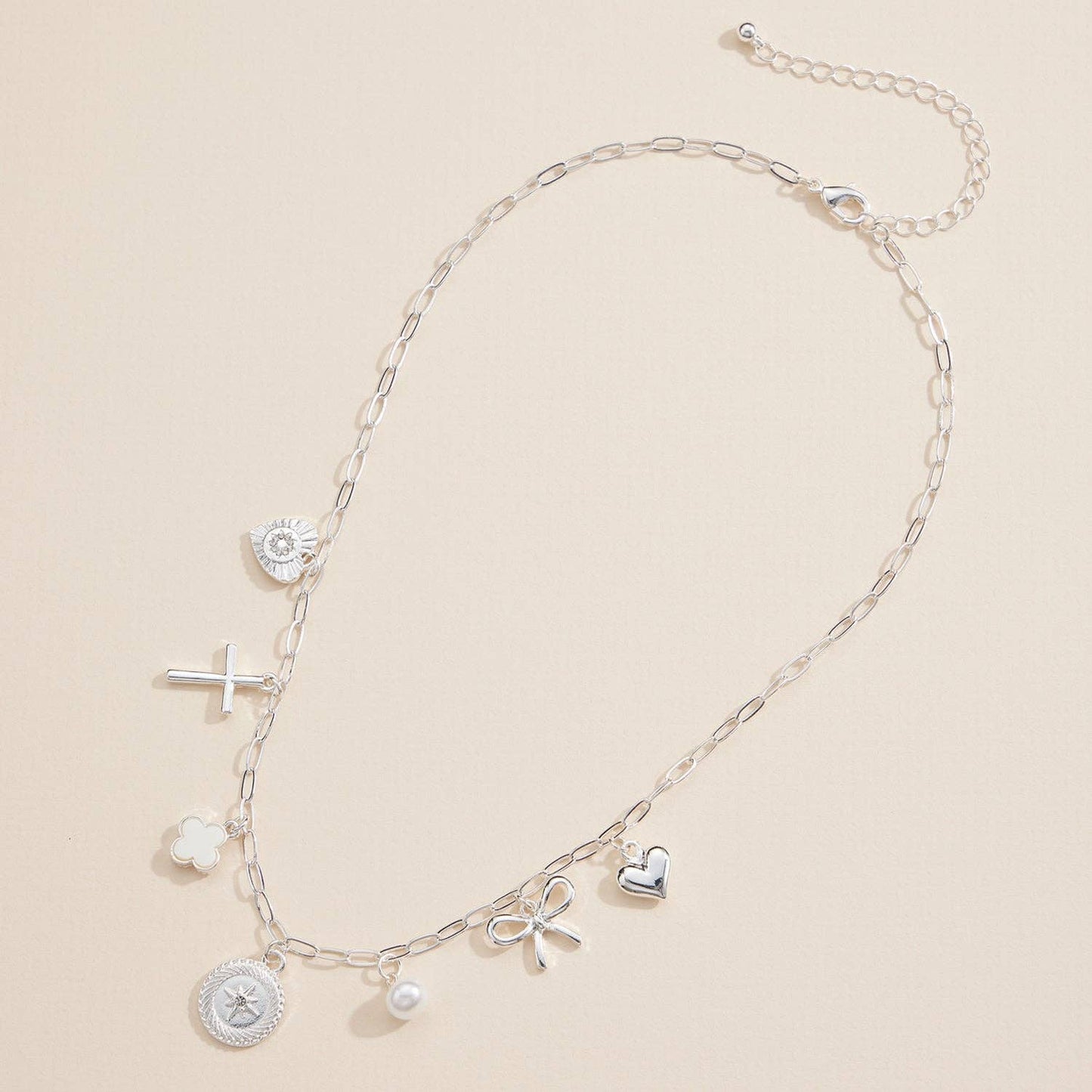Charm Necklace with Heart, Cross, Compass Pearl, and Bow Pendants